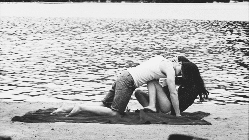 Playful Beach Kiss And Embrace GIF