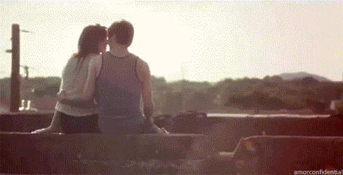 Playful Cheek Kiss Sunset GIF