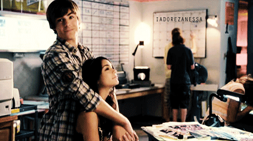Playful Couple Cuddling GIF
