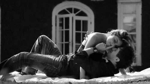 Playful Couple Frolicking Intimate GIF