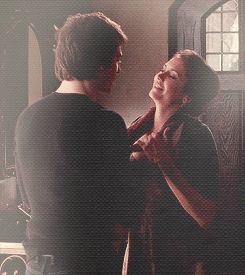 Playful Flirty Couple Cuddling GIF