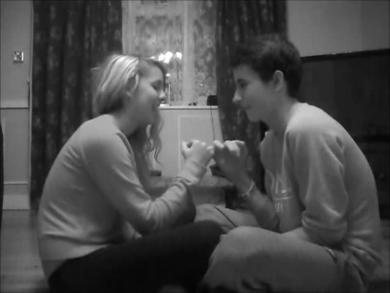 Playful Hand Wrestling Couple GIF
