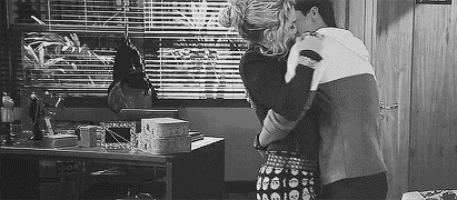 Playful Intimate Couple Kiss GIF