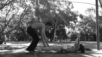 Playful Outdoor Intimate Kiss GIF