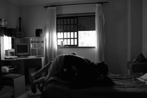 Playful Passionate Lovers Cuddle GIF