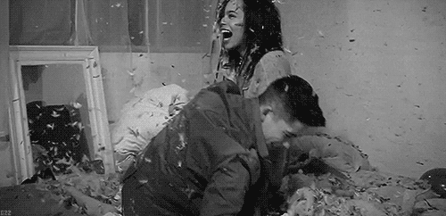 Playful Pillow Fight GIF