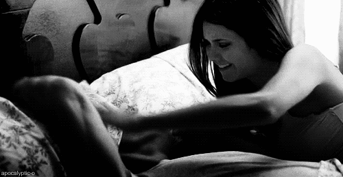 Playful Tickle Under Blankets GIF