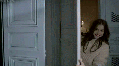 Playful Door Opening Flirty Kiss GIF