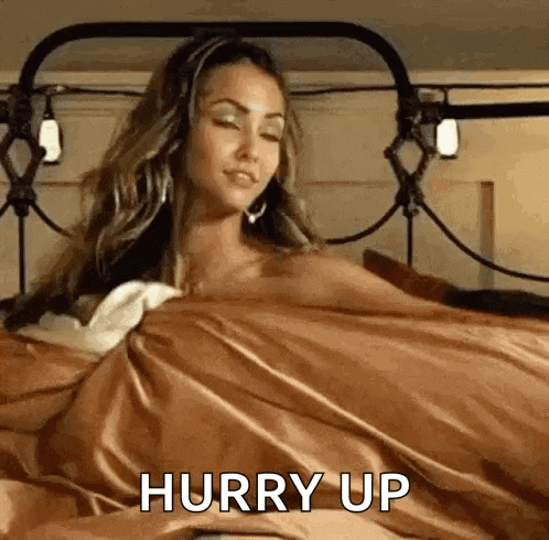 Playful Woman Tossing Blanket Flirty GIF
