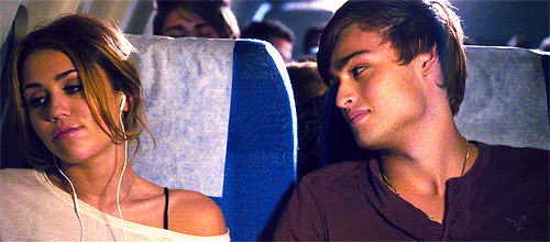 Romantic Airplane Flirting Moment GIF