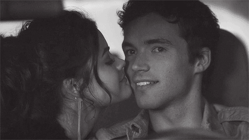 Romantic Cheek Kiss in Car GIF