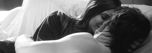 Romantic Couple Cuddling In Bed GIF