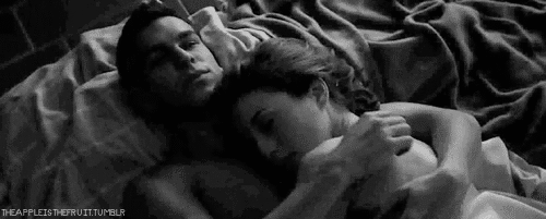 Romantic Couple Cuddling In Bed GIF