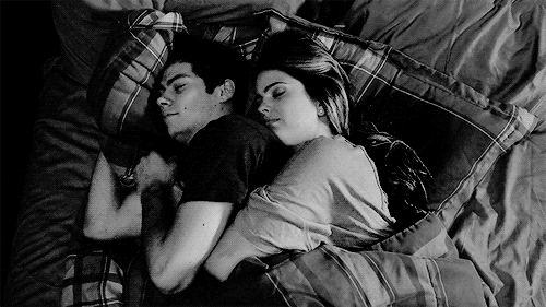 Romantic Couple Cuddling In Bed GIF