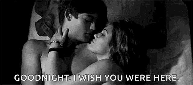 Romantic Couple Cuddling In Bed GIF