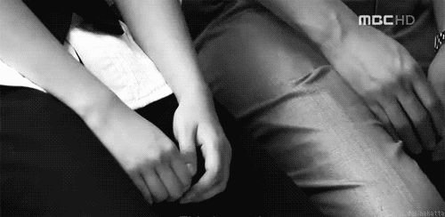 Romantic Couple Holding Hands GIF