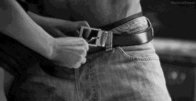 Seductive Belt Unbuckle Passionate Kiss GIF