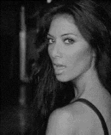 Sensual Gaze Over Shoulder GIF