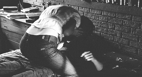 Sexy couple on bed making out gif