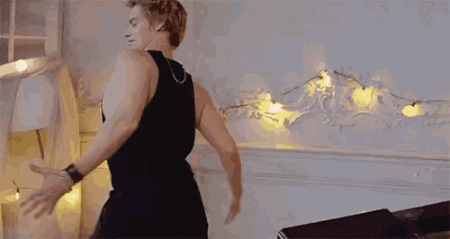 Sexy Man Dancing Flirtatiously GIF