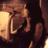 Sexy Woman Sips Drink Flirty GIF
