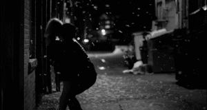 Snowy Alley Intimate Kiss GIF
