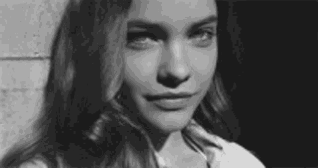 Sultry Flirtatious Smile GIF