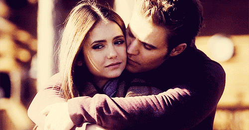 Loving Couple Shares Tender Kiss GIF